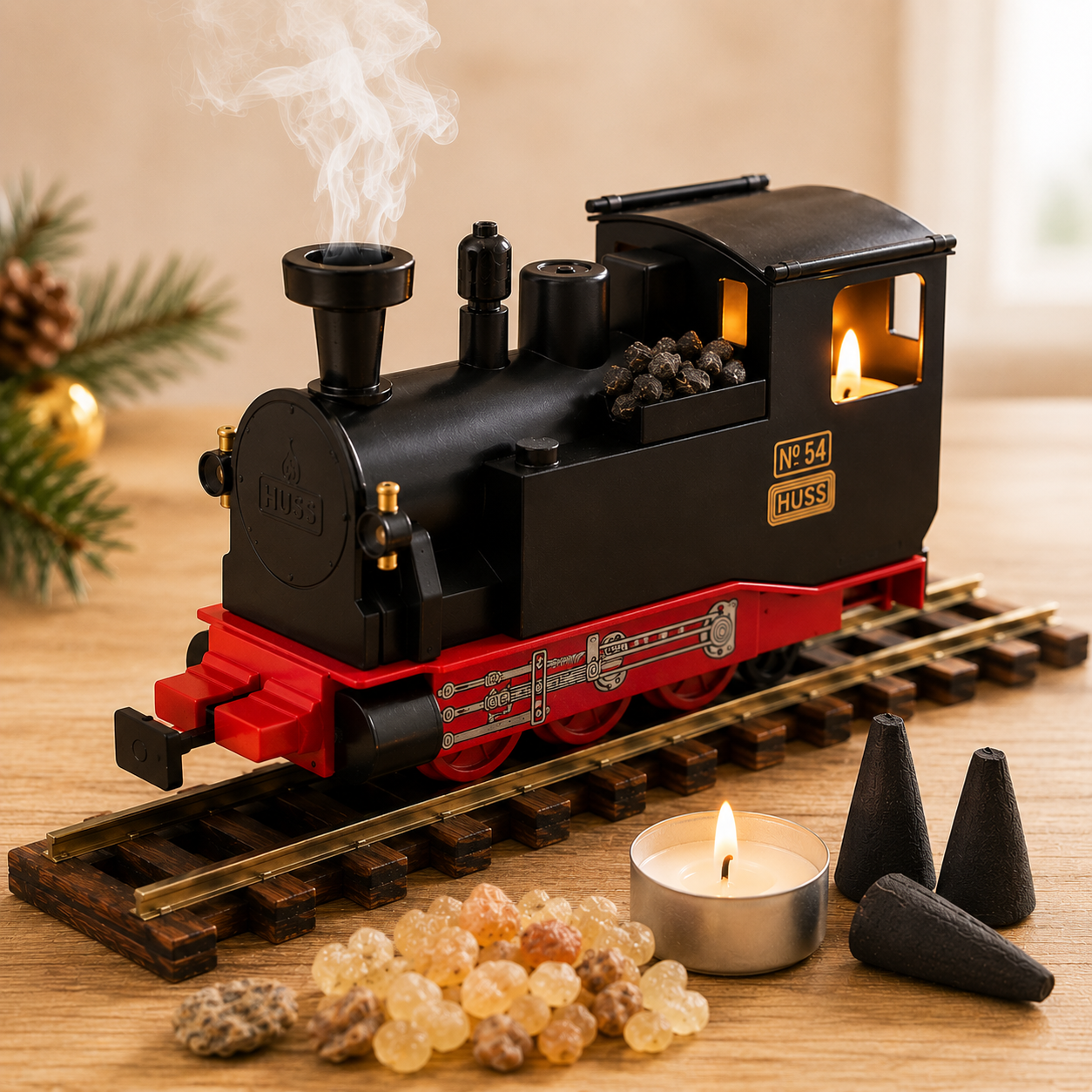 HUSS Incense Train black locomotive incense burner with smoke rising from the chimney, a glowing tealight, and incense cones on railway tracks.