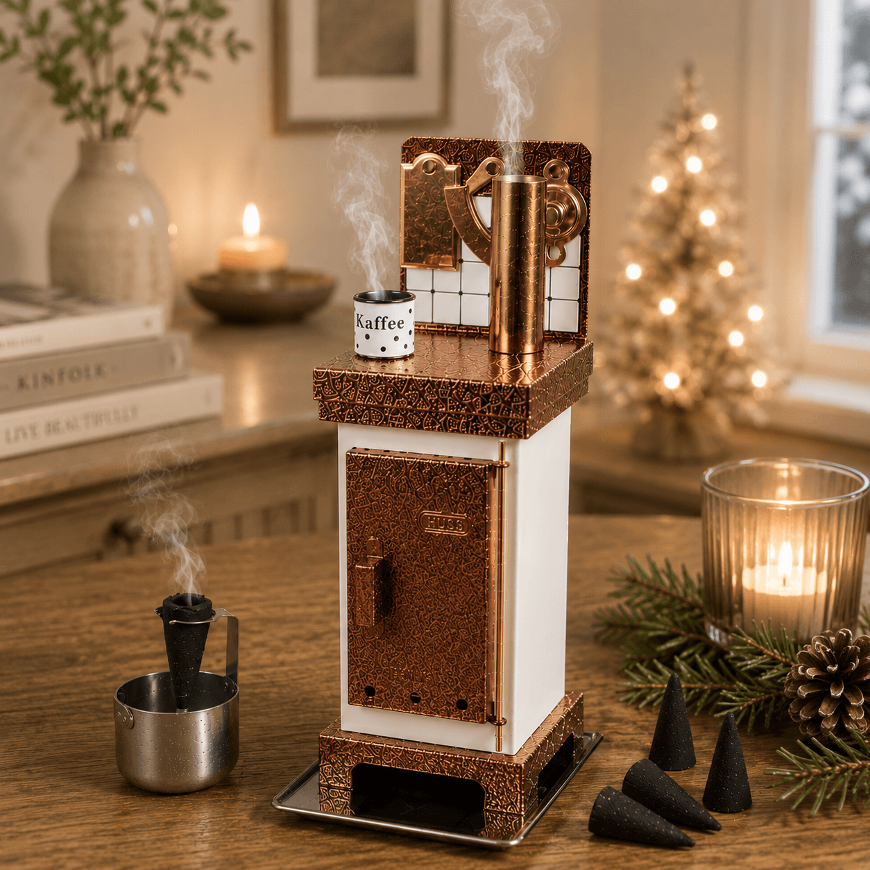Steaming HUSS Incense cone oven in white/copper on a table with some incense cones and Christmas deco