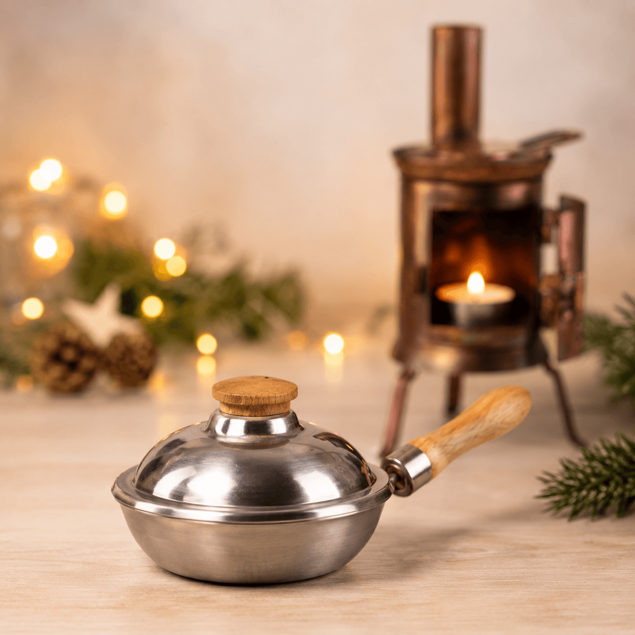 HUSS Incense iron pan displayed on a wooden table with Christmas decor