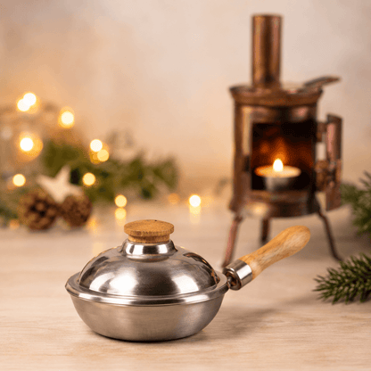 HUSS Incense iron pan displayed on a wooden table with Christmas decor