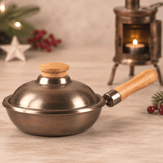 HUSS Incense iron pan on a wooden table with the HUSS Incense Table Huss' in the back