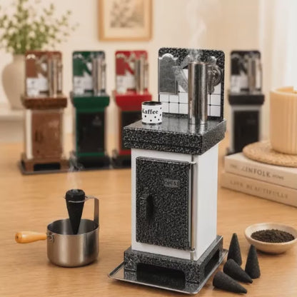 Video of a HUSS Incense cone oven in white and silver with rising steam, displayed on a wooden table with incense cones and further colors of the oven in the back.